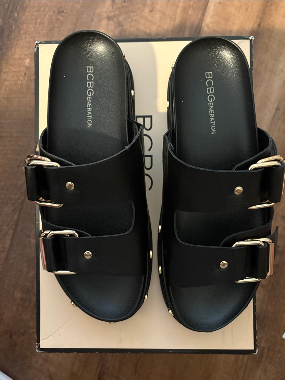 BCBGeneration Black Double-Strap Slide Sandals with Gold Hardware